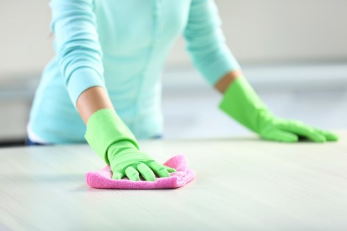 Supervisor reviewing a workplace risk assessment with cleaning staff